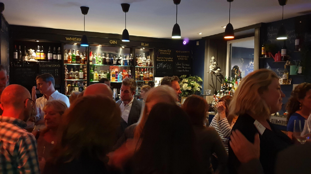 Image of crowd at a bar