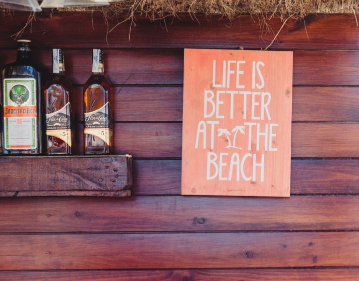 sign saying life is better at the beach
