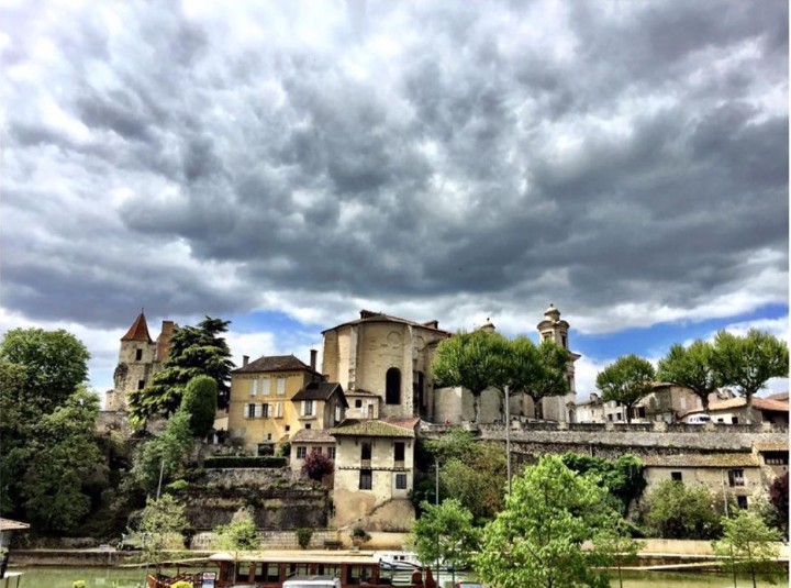 Village by the river on a cloudy day